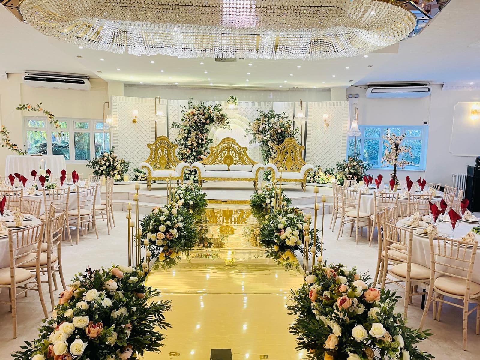 The room dressed for a South Asian wedding