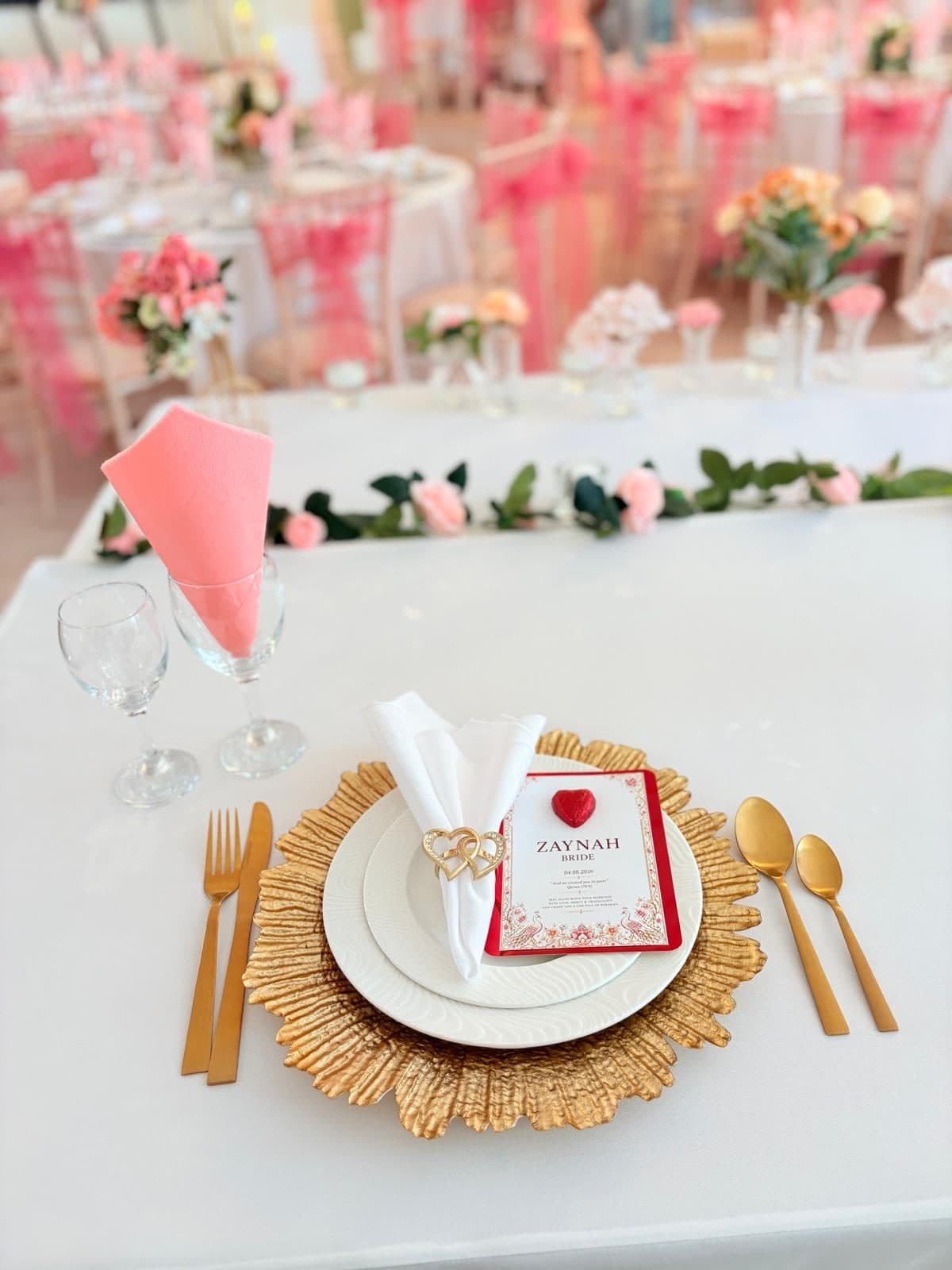 A place setting with gold cutlery