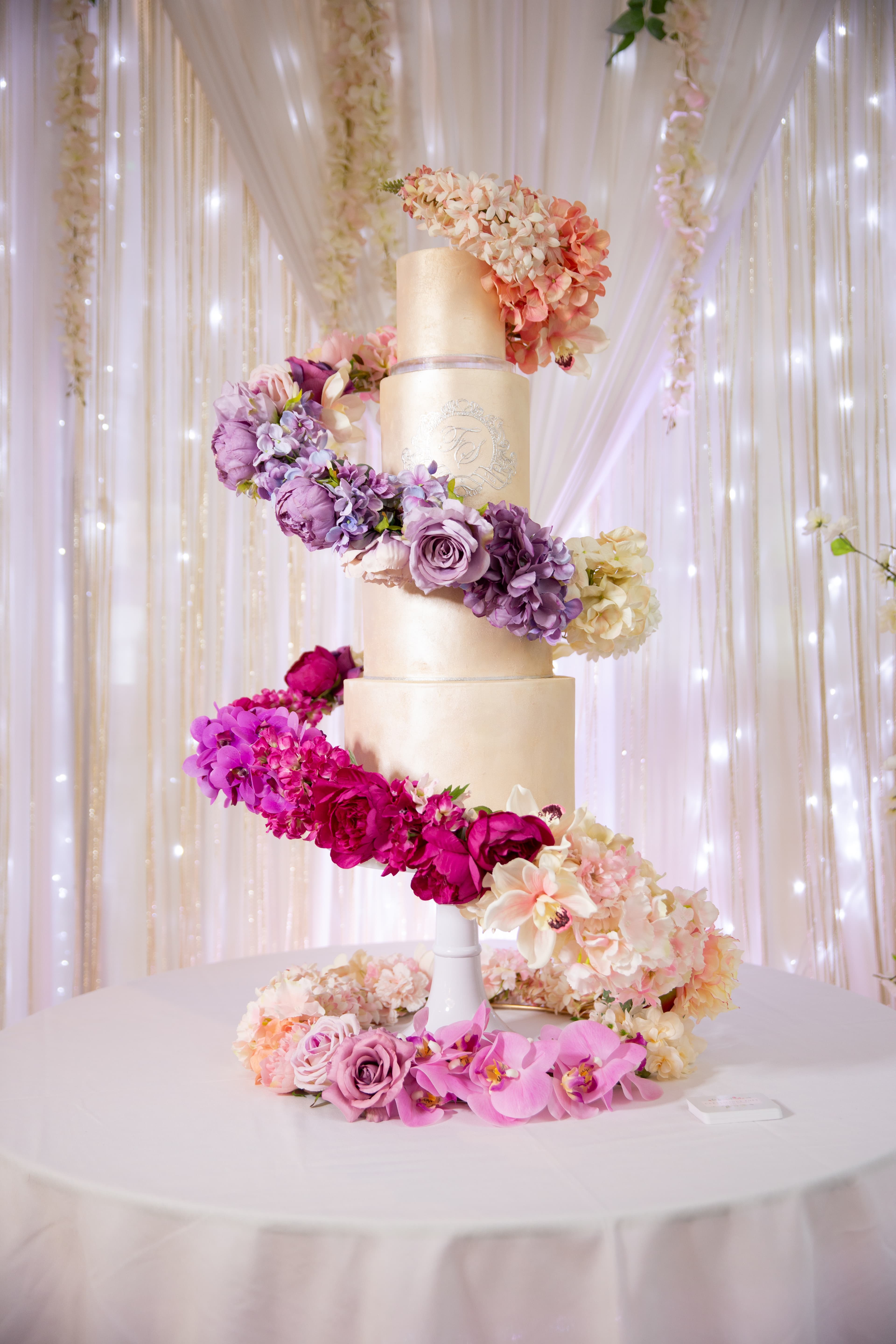 A wedding cake on its table